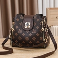 Vintage brown monogram bucket bag with gold clover lock and adjustable shoulder strap - FAK Coffee