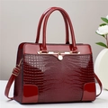 Glossy red crocodile texture handbag with gold metal lock and detachable shoulder strap - Burgundy
