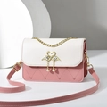 Pink and white square crossbody bag with heart quilting and swan hardware detail - Pink