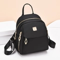 Mini zaino nero da donna in nylon Oxford con eleganti cerniere in metallo dorato - Nero