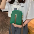 Vertical green faux leather crossbody phone bag with brown accents and gold hardware - Green