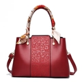 Elegant deep red bridal handbag with floral embroidery and decorative handle scarf - Wine Red (Includes Red Scarf)