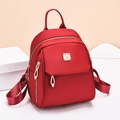Zaino da donna rosso alla moda in nylon impermeabile con finiture in metallo oro - Rosso