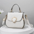 White quilted wavy bucket bag with golden heart crown lock and top handle - Off-white