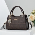 Elegant dark brown monogram handbag for women with gold logo and heart pearl pendant - Coffee