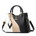 Borsa a mano tricolore in nero e beige con tracolla regolabile e charm a farfalla - Nero Blocchi di Colore