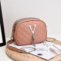Dusty pink quilted crossbody bag with three zipper layers and silver V-shaped tassel charm - Pink