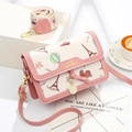 Pink and beige crossbody bag with world landmark prints and two detachable shoulder straps - Pink
