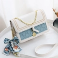 Chic colorblock crossbody bag with blue checkerboard pattern and silk scarf decor - Blue