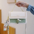 Green and beige patchwork crossbody bag with floral embroidery and golden chain - Cyan