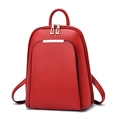 Minimalist red synthetic leather backpack featuring golden metal zipper and top handle - Burgundy