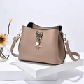Chic beige bucket bag for women with Mickey Mouse metal buckle and gold charms - Khaki
