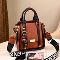 Vintage brown leather handbag with contrast trim, wide shoulder strap and bear charm - Earthy Yellow
