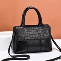 Large black soft leather handbag with crocodile pattern flap and adjustable strap - Black