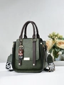 Dark green textured leather handbag with brown handles and a cute cartoon bear charm - Army Green