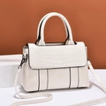 Chic beige faux leather handbag with crocodile pattern flap and adjustable strap - White