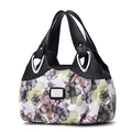 Floral print tote bag with black leather handles and spacious interior for daily use - Black / Green Flower
