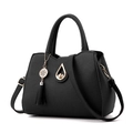 Elegant black faux leather tote bag with gold teardrop clasp and tassel detail - Black