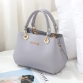 Elegante borsa a mano in pelle grigia con logo dorato per matrimoni e occasioni formali - Grigio