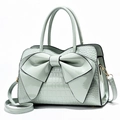 Mint green patent leather tote with crocodile pattern and large bow decoration - Light Green