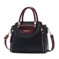 Elegante borsa bicolore nero e rosso scuro con finiture in metallo dorato - Nero