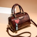 Dark brown faux crocodile skin Boston bag with gold hardware and heart charm pendant - Brown