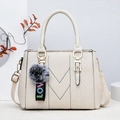 Off-white lychee texture handbag with LOVE pompom charm and adjustable strap - White