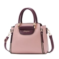 Elegante borsa bicolore rosa e bordeaux con tracolla regolabile e manico superiore - Rosa