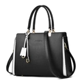 Bolso de mano clásico en cuero blanco y negro con detalles dorados y asa superior - Negro