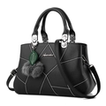 Black leather handbag with white embroidery and fur ball charm on white background - Single Bag / Black