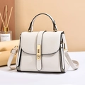 White litchi pattern leather handbag with gold metal lock and adjustable shoulder strap - White