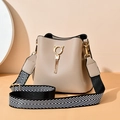 Elegant khaki bucket bag for women with cat ear fringe and chevron pattern strap - Khaki