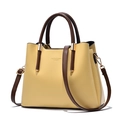 Fashionable bright yellow tote bag with brown handles and adjustable crossbody strap - Yellow