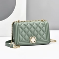 Morandi green quilted crossbody bag with golden clover clasp and chain strap - Green