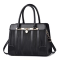Classic black handbag with wave texture, golden hardware and adjustable shoulder strap - Black
