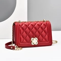 Red quilted chain shoulder bag with floral metal twist lock and gold strap detail - Burgundy