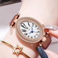 Elegant oval watch with rose gold diamond bezel, blue hands, and brown leather strap - Rose Gold Case White Dial Brown Strap