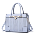 Light blue faux leather handbag with wave embossing and golden hardware accents - Blue