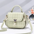 Light green quilted faux leather crossbody bag with iconic mouse metal clasp and star pendant - Green