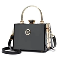 Mini black glossy patent leather handbag with gold W logo and crystal clasp detail - Black
