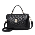Classic black quilted crossbody bag with gold-tone hardware and elegant top handle - Black