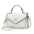 White quilted crossbody bag with gold twist lock and black edge detailing - White