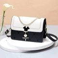 Contrast color black and white crossbody bag with quilted heart pattern and chain strap - Black & Beige