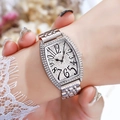 Silver tonneau quartz watch with crystal-encrusted bezel and silver steel link strap - Silver White