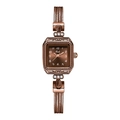 Detail of rose gold square watch with crystal accents and woven metal mesh strap - Brown Case Brown Dial