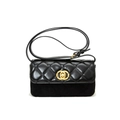 Quilted black crossbody bag with matte finish and gold circular interlocking clasp - Black