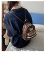 Detailed back view of vintage floral child backpack featuring plaid pocket and lace trim - S / Floral Green Small