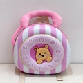 Detail showing cartoon hamster dial on striped toddler backpack with plush handle - Pink