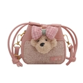 Pink drawstring bucket bag for kids featuring a plush puppy and colorful Vogue tag - Pink