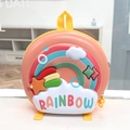 Detail of 3D hardshell kids backpack featuring colorful rainbow and star decorations - Orange